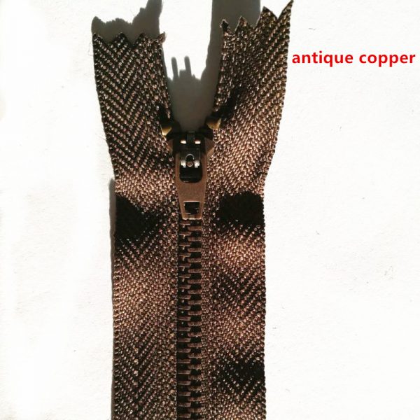 Purple bronze zip with double sliders arranged in head to head